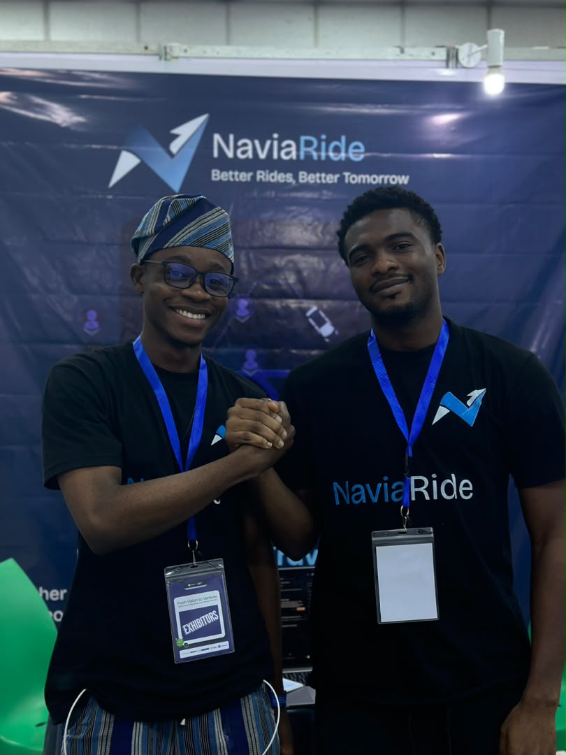 NaviaRide team engaging attendees at the exhibition booth